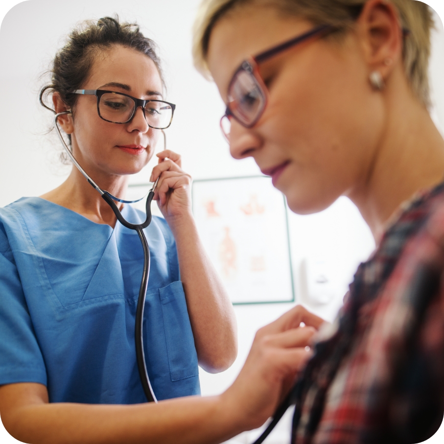 patient explaining issues to doctor using tablet
